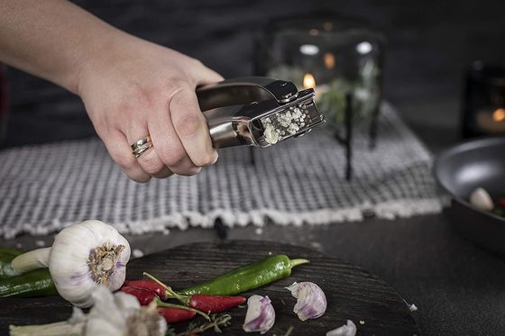 چند جارو آشپزخانه گرم فولاد ضد زنگ پریس سیر برای ابزار آشپزخانه پایدار