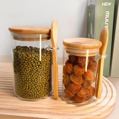 ظروف ذخیره سازی مواد غذایی شیشه ای شفاف با طراحی کاربردی و کاور چوبی گرد