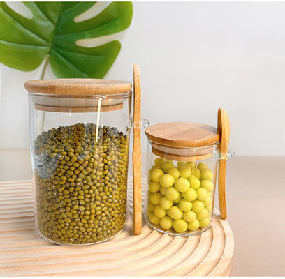 ظروف ذخیره سازی مواد غذایی شیشه ای شفاف با طراحی کاربردی و کاور چوبی گرد